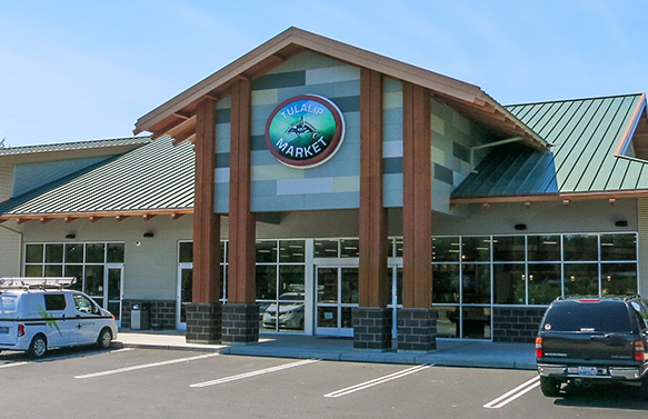 Tulalip Market view of the newly completed front doors – the best place for growlers, gas, wine, liquor and deli items in Marysville, just off 1-5 on 116th Street NE, Exit 202